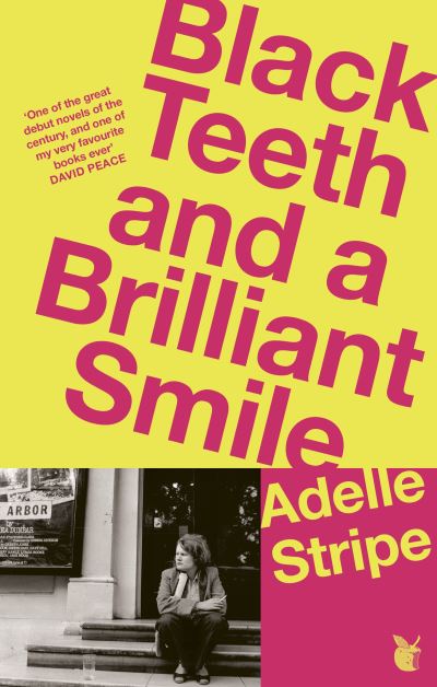 Black teeth and a brilliant smile