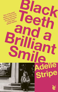 Black teeth and a brilliant smile